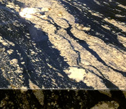 A black and gold marble countertop.